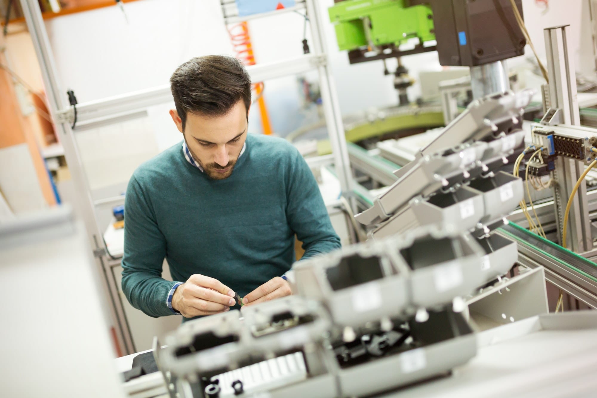 Mechanical engineer working on machines